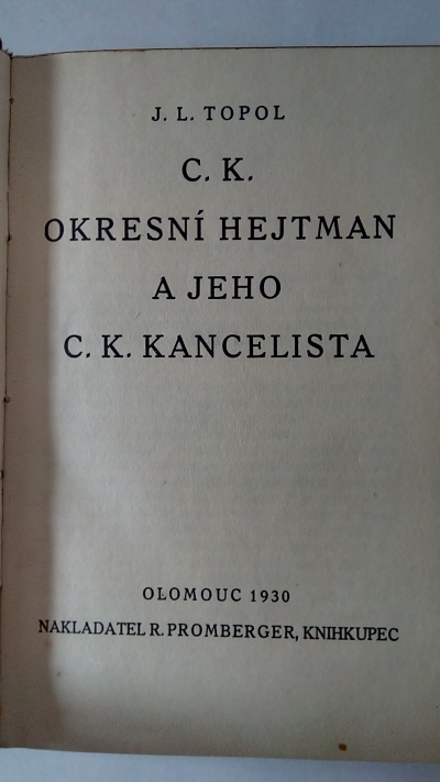 C. K. okresní hejtman a jeho C. K. Kancelista